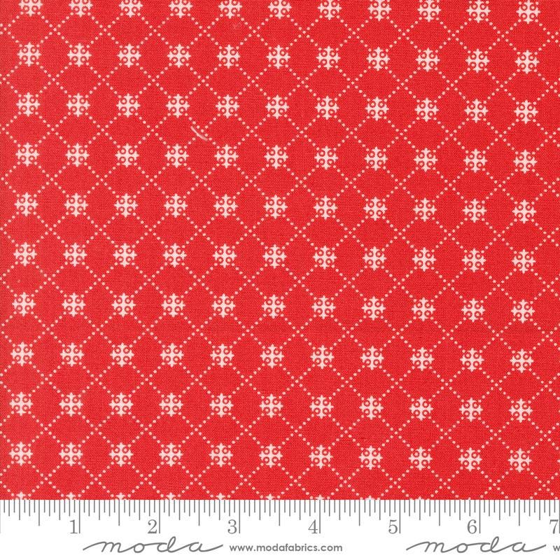 a red fabric with white crosses on it