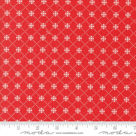 a red fabric with white crosses on it
