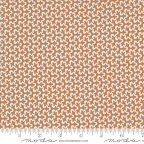 a ruler with a brown and white pattern on it