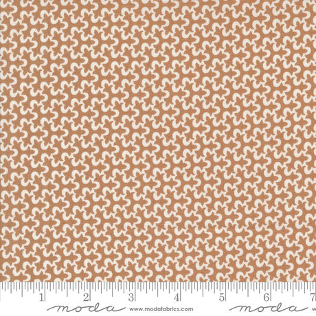 a ruler with a brown and white pattern on it