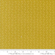 a yellow fabric with white dots on it