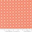 an orange and white fabric with a pattern on it