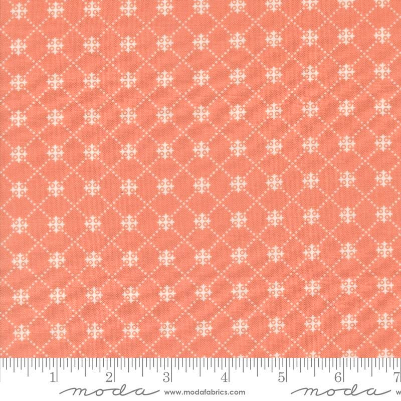 an orange and white fabric with a pattern on it