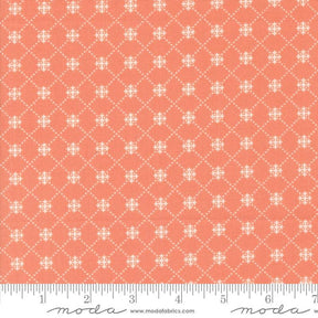 an orange and white fabric with a pattern on it
