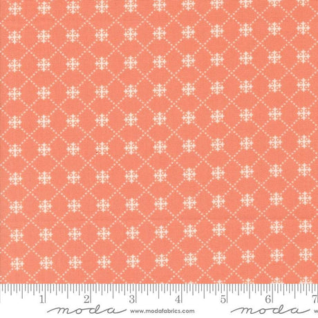 an orange and white fabric with a pattern on it