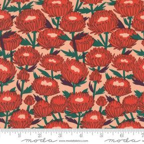 a red flower pattern on a pink background