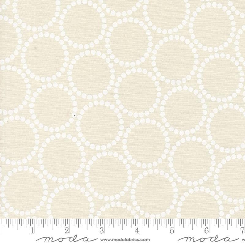 a white fabric with circles on it