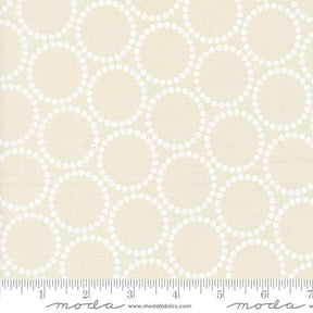 a white fabric with circles on it