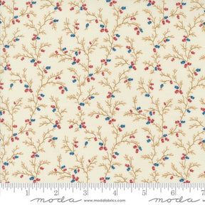 a white fabric with blue and red flowers on it