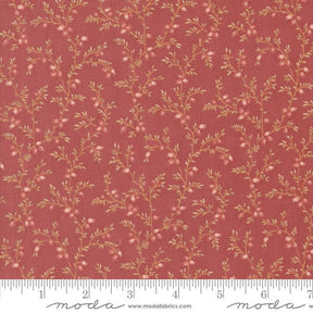 a red fabric with small flowers on it