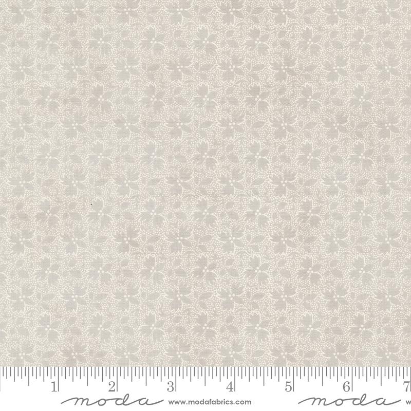 a ruler with a white flower pattern on it