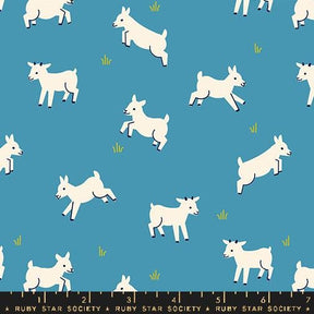 a blue background with white dogs on it
