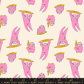 a pink and yellow pattern with a bear on it