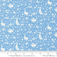 a blue background with white rabbits and mushrooms