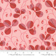 a pink background with red leaves on it