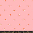 a pink background with orange and white polka dots