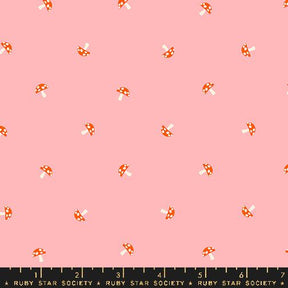 a pink background with orange and white polka dots
