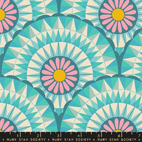 a blue and pink pattern with flowers on it