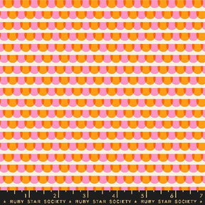 a ruler with an orange and pink pattern on it