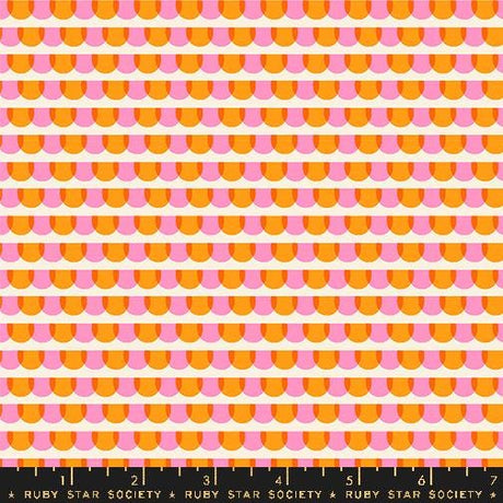 a ruler with an orange and pink pattern on it