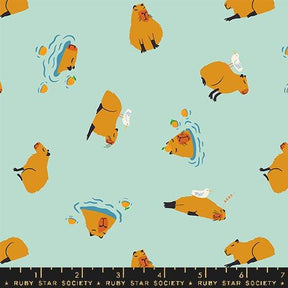 a blue background with a bear and a bird on it