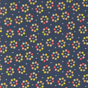 a blue background with multicolored flowers on it
