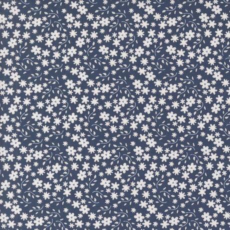 a blue and white background with white flowers