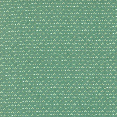 a green background with small white leaves