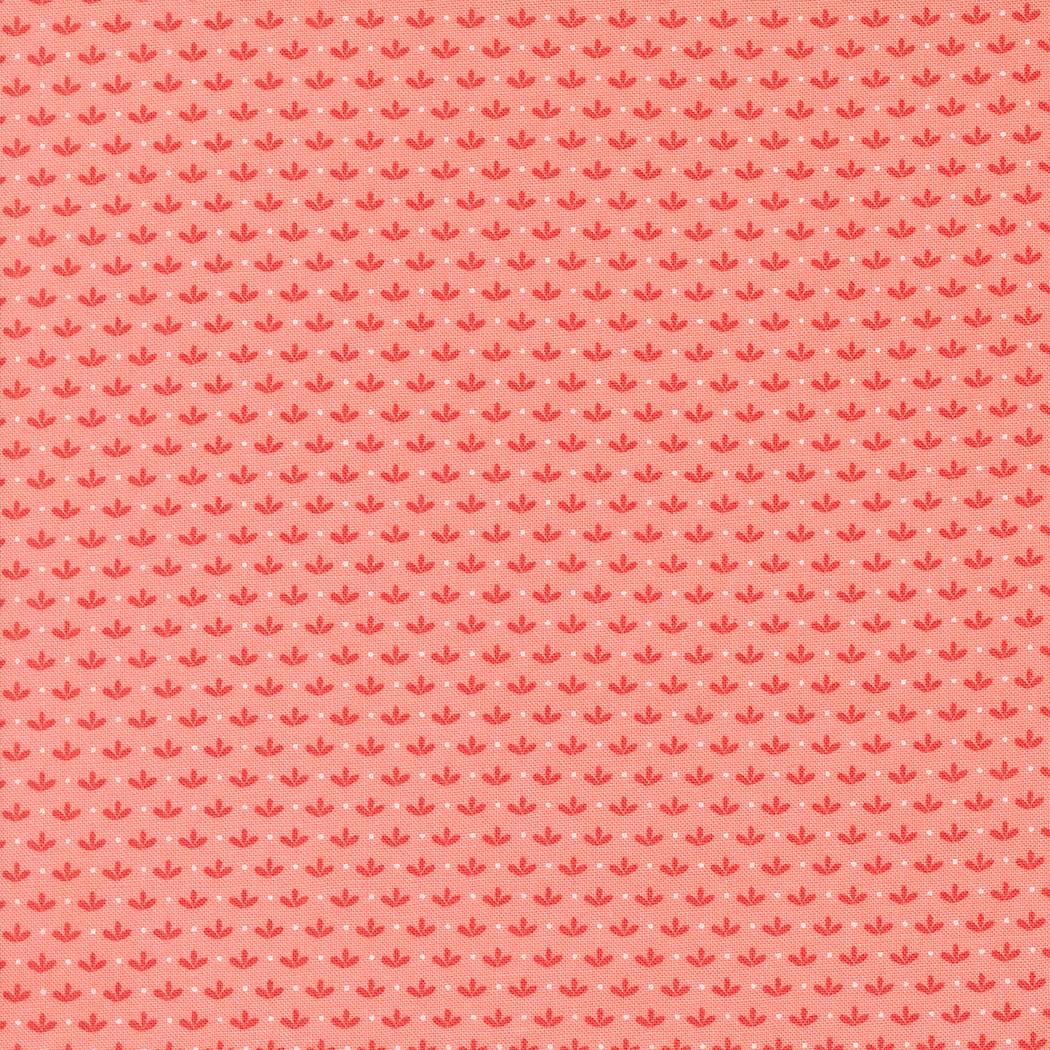 a red background with a pattern of small circles