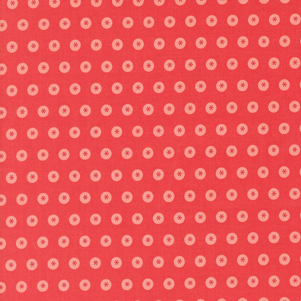 a red background with white circles on it