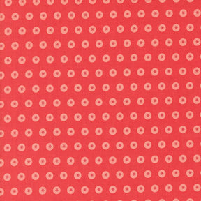a red background with white circles on it