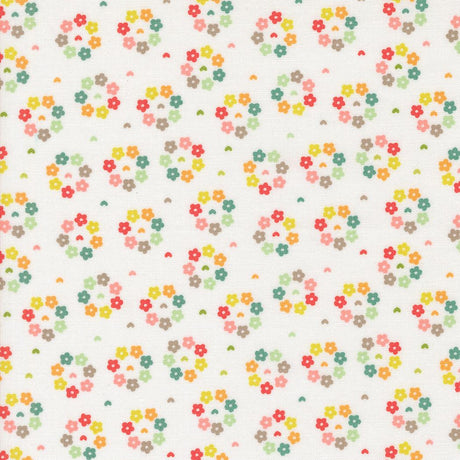 a white background with multicolored flowers on it