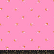 a pink background with red and white polka dots