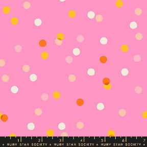 a pink background with orange and white polka dots