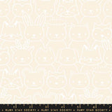 a white cat pattern on a beige background