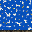 a blue background with white cats and flowers