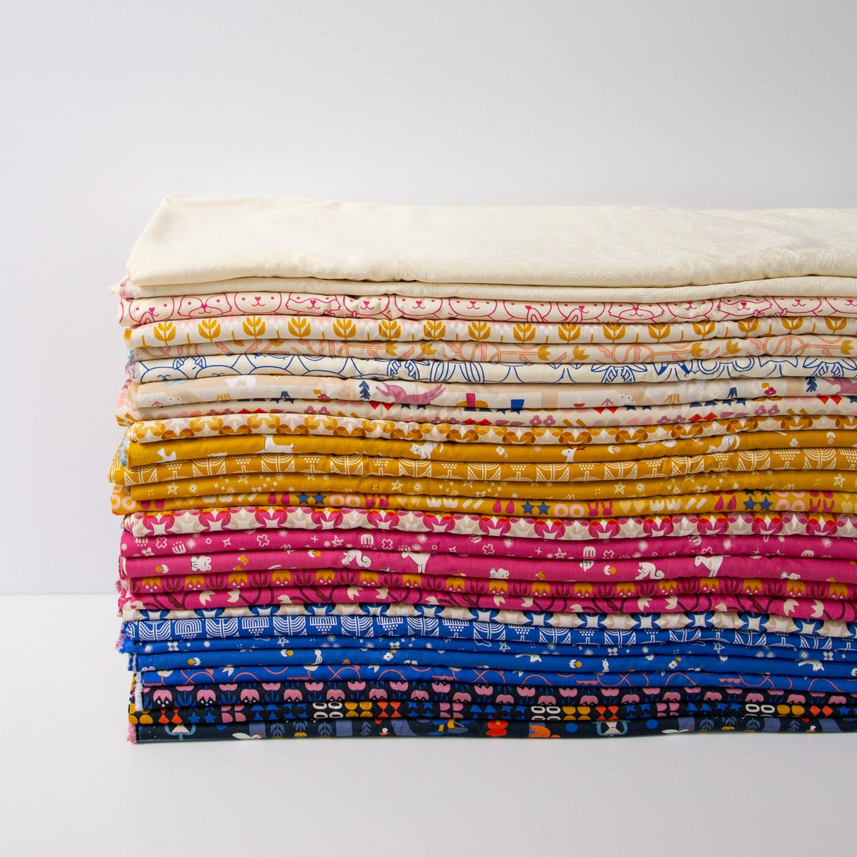 a stack of cloths sitting on top of each other