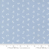 a blue fabric with white flowers on it
