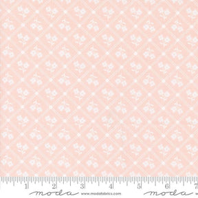 a pink background with white flowers on it