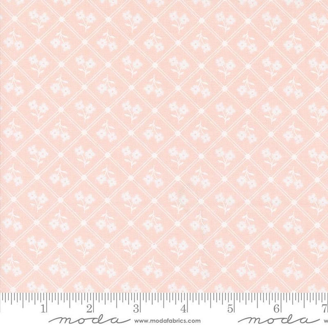 a pink background with white flowers on it