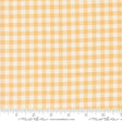 a yellow and white checkered fabric with a ruler