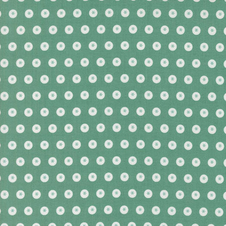a green background with white dots