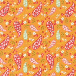 an orange background with a pattern of birds and flowers