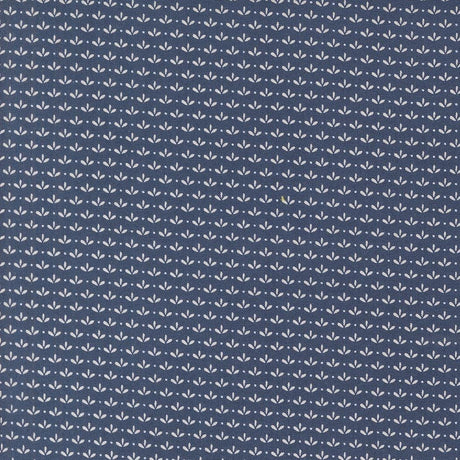 a blue background with white leaves on it
