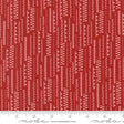 a ruler with a red and white pattern on it