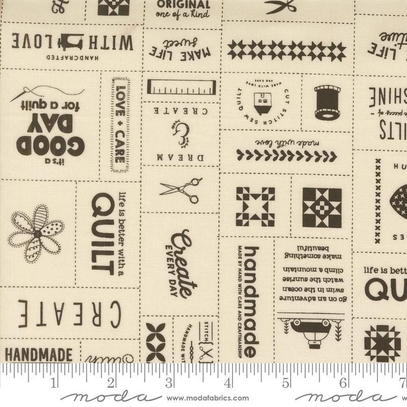 a white fabric with black and white designs on it