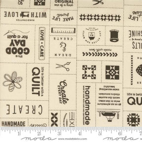 a white fabric with black and white designs on it