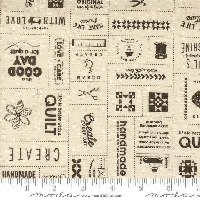 a white fabric with black and white designs on it