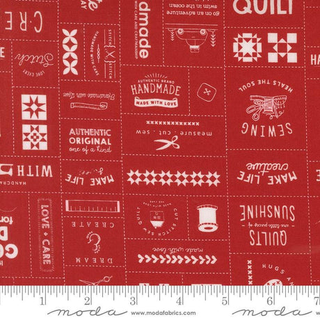 a ruler with a red background with white lettering