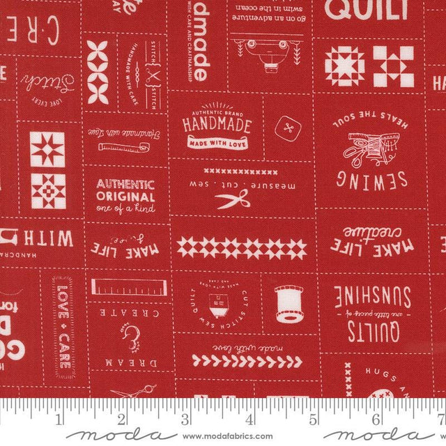 a ruler with a red background with white lettering